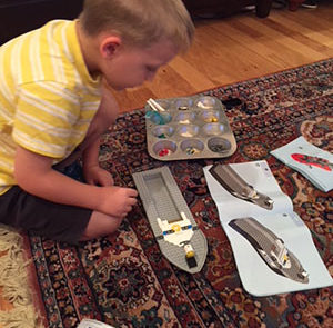 Our grandson, Xavier, builds his own models